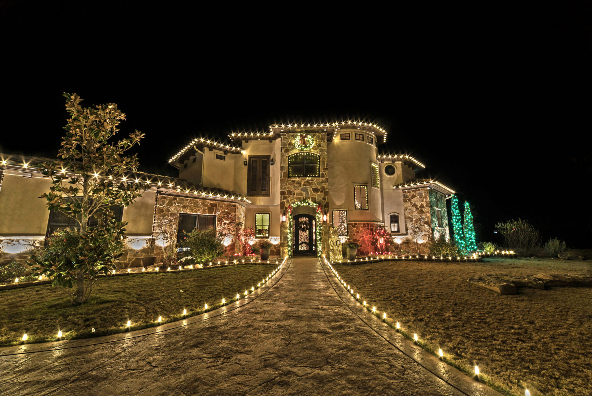 christmas lighting installation on home